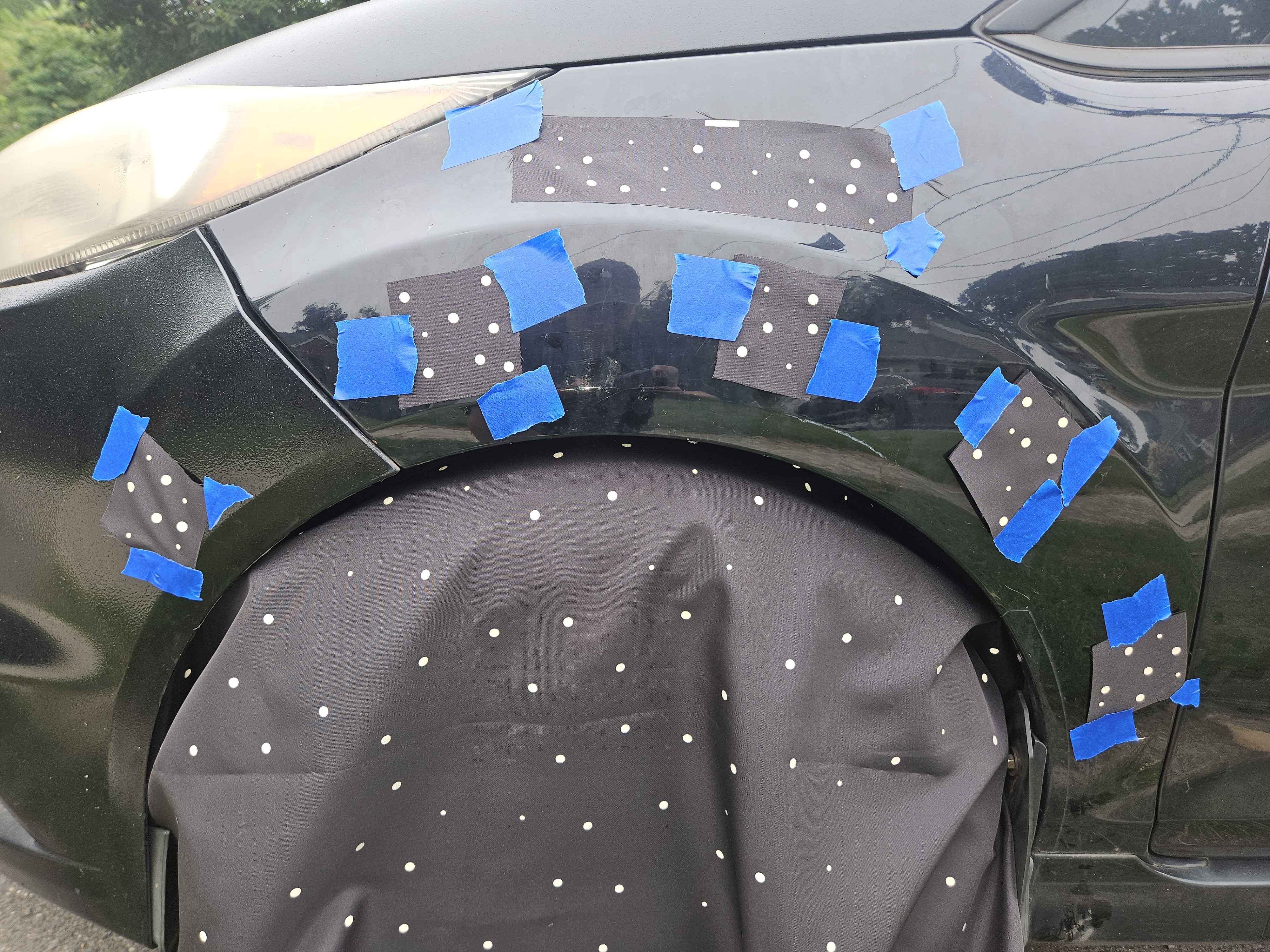 Partial view of ScanCloth scanning surface showing integrated fiducial markers on fabric